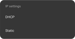 Closeup of the IP settings screen showing the options DHCP and Static.