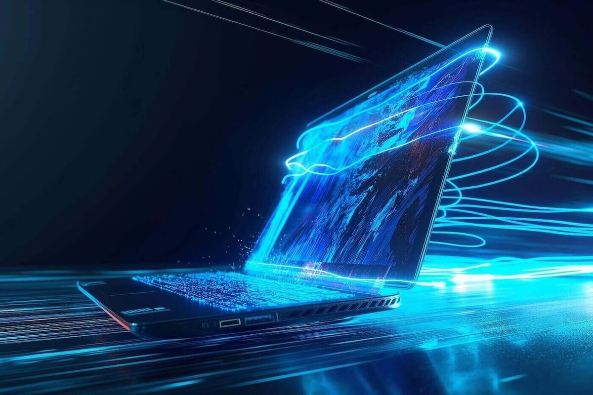 An image of a laptop that looks like it’s moving very quickly over a digital landscape and is surrounded by blue, neon lights.